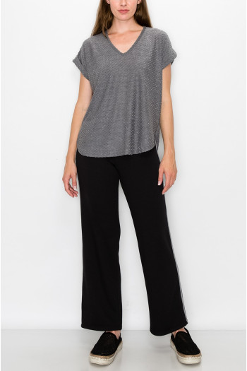 SWISS DOT JERSEY V NECK ROLLED SLV